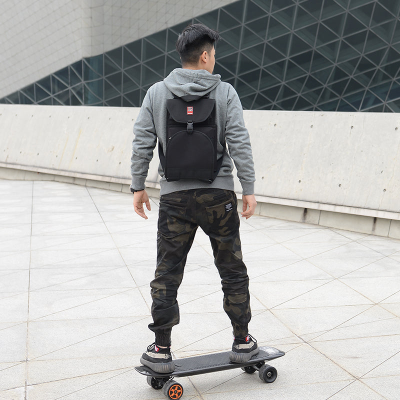 Double rocker one-shoulder skateboard backpack